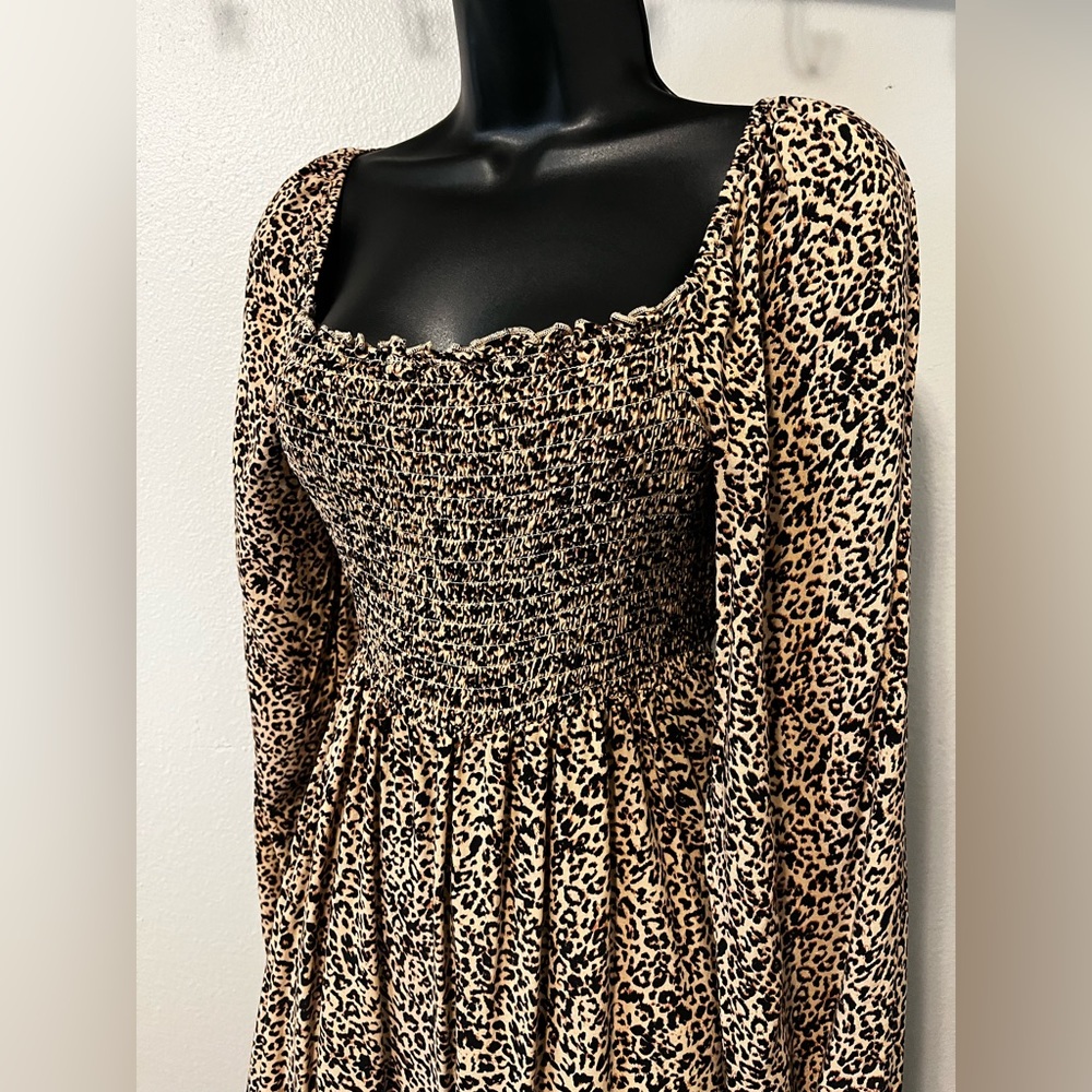 LOVE, FIRE women’s mini dress. Long sleeve. Animal print, size L, pre owned.
